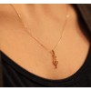 pendentif or clé de sol et diamant