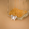 Pendentif deux ors 18 carats "papillon"