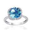Bague or blanc 9 carats, topaze Swiss Blue et diamant 0,08 carat