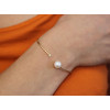 Jonc or 18 carats, diamant 0,030 carat et perle de culture