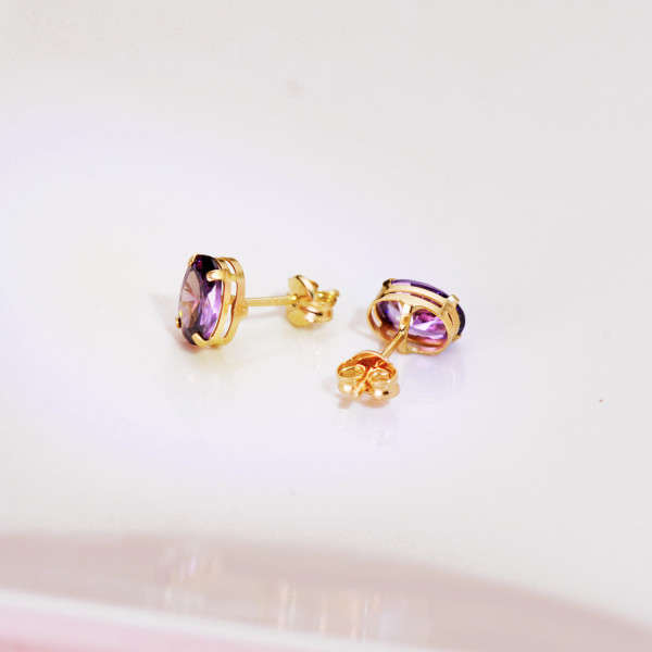 Boucles d'oreilles améthyste 7 x 5 mm et or jaune 18 carats