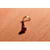 Piercing nez or 9 ou 18 carats et rubis