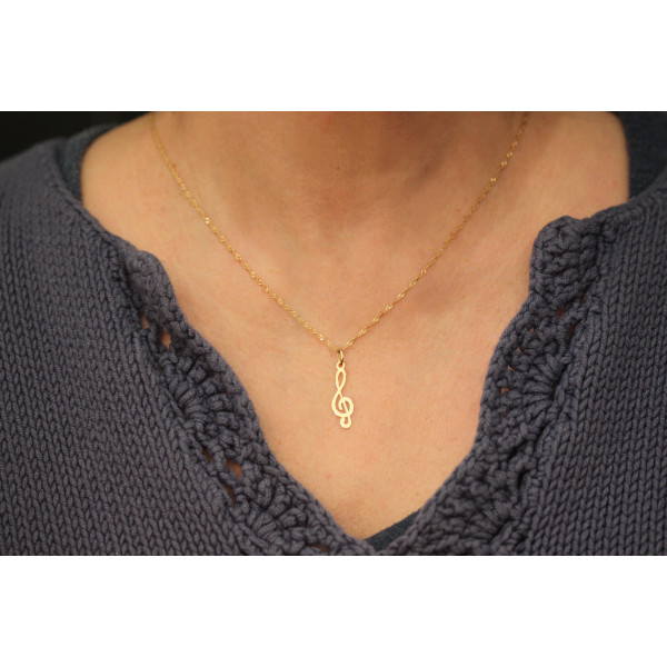 Pendentif or 18 carats "clé de sol"