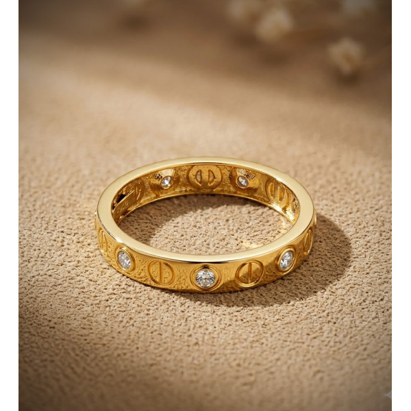 Bague or jaune 18 carats et zirconiums en entourage "motif vis"