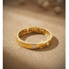 Bague or jaune 18 carats et zirconiums en entourage "motif vis"