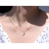 Pendentif or 9 carats "raquette de tennis"