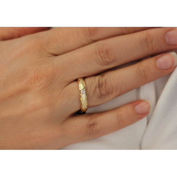 Duo d'alliances Breuning or jaune 18 carats et diamants 0,13 carat "tentation"
