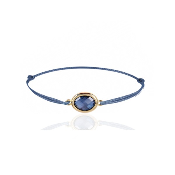 Bracelet cordon ajustable et topaze blue London ovale à facettes