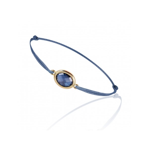 Bracelet cordon ajustable et topaze blue London ovale à facettes