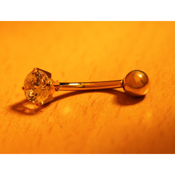 Piercing nombril or jaune 18 carats et zirconium