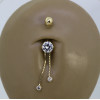 Piercing nombril or jaune 18 carats et zirconiums pendants