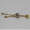 Piercing nombril or jaune 18 carats et zirconiums pendants